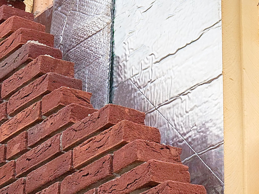 Insulation Behind Brick Wall